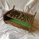 Porte-revue vintage en bois sculpté
