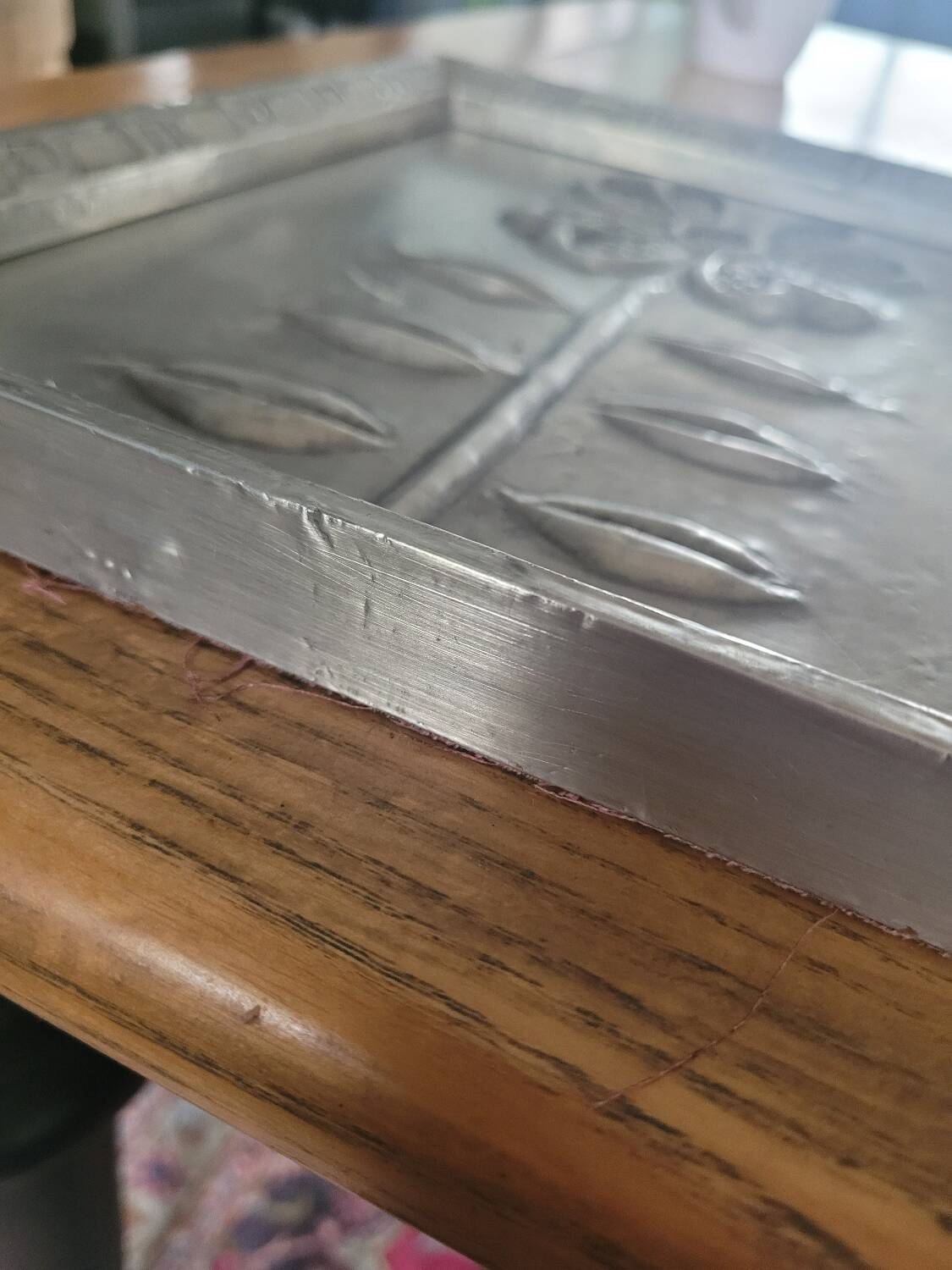 Pair of embossed flower paintings