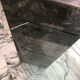 Roche Bobois console in veined black marble and glass, 1990s.