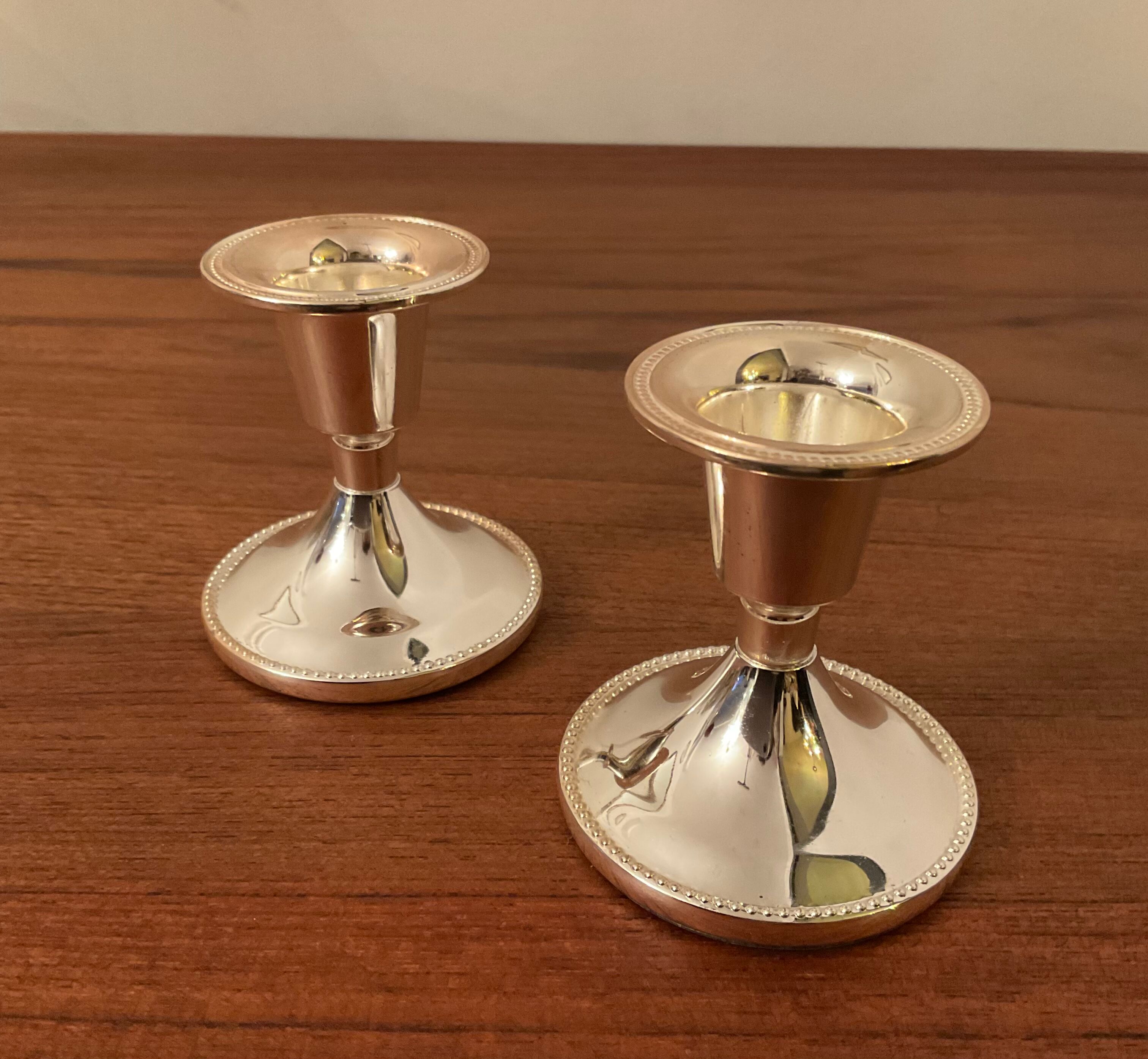 Pair of vintage silver metal candle holders