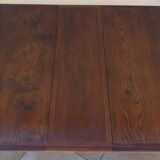 Extendable mahogany table with 6 tapered and fluted legs, Louis XVI style