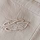 12 old damask linen napkins with a monogram