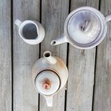 Trio of sandstone pitcher teapots
