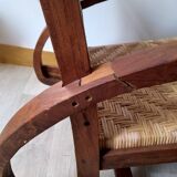 Pair of Art Deco woven rattan armchairs and table