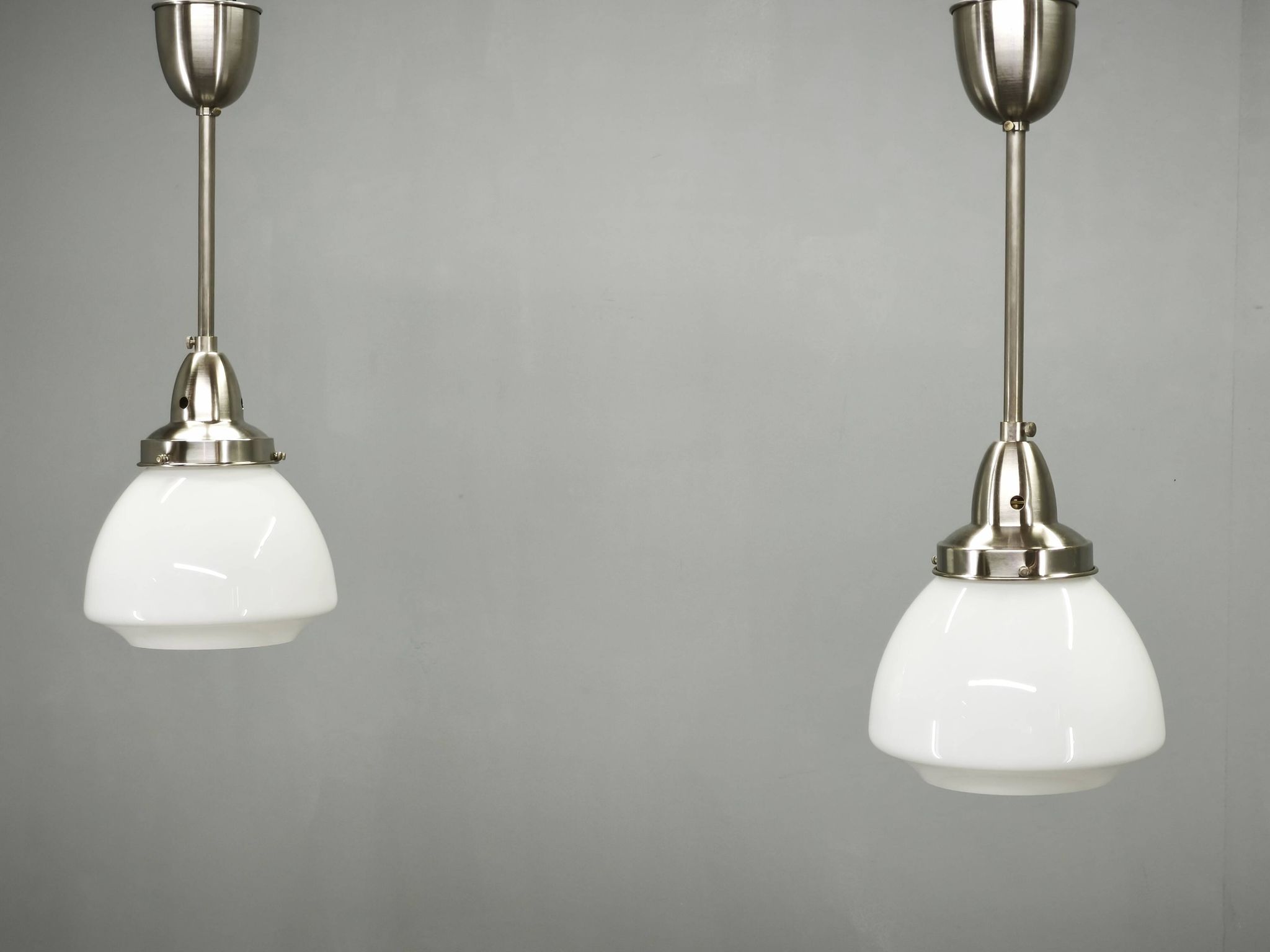 Pair of 1930s Czech Art Deco Opaline Glass and Chrome Pendant Lights