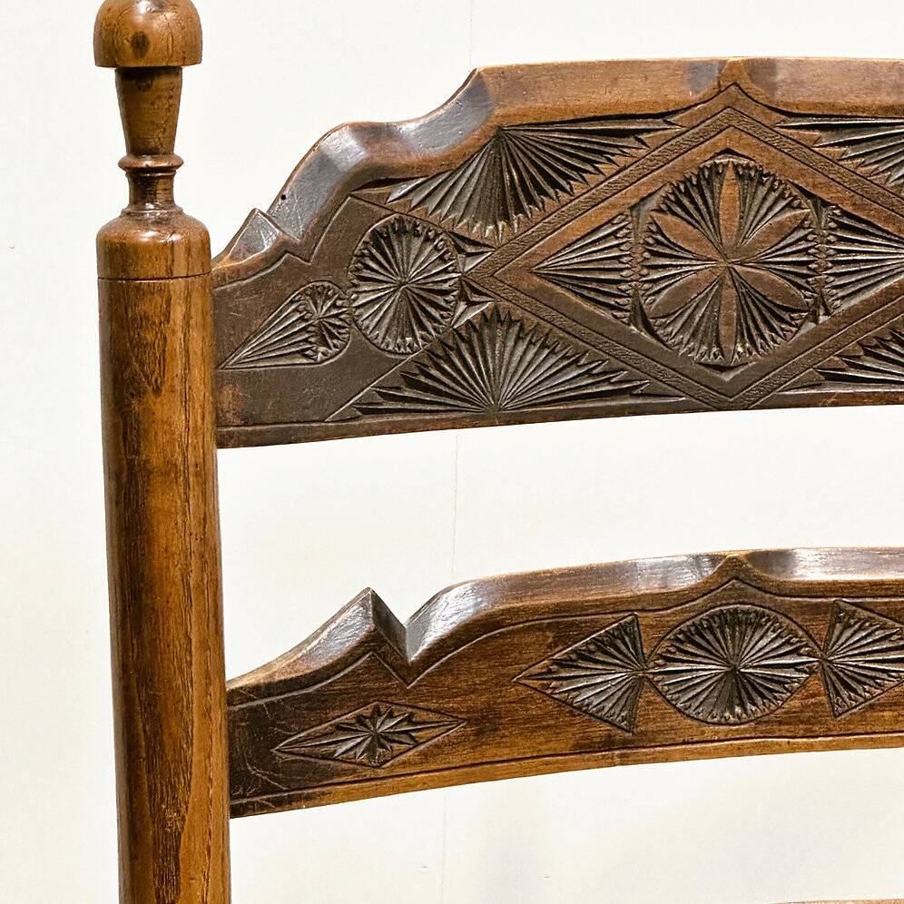 19th century handcrafted and carved ladder back chair, circa 1840s.