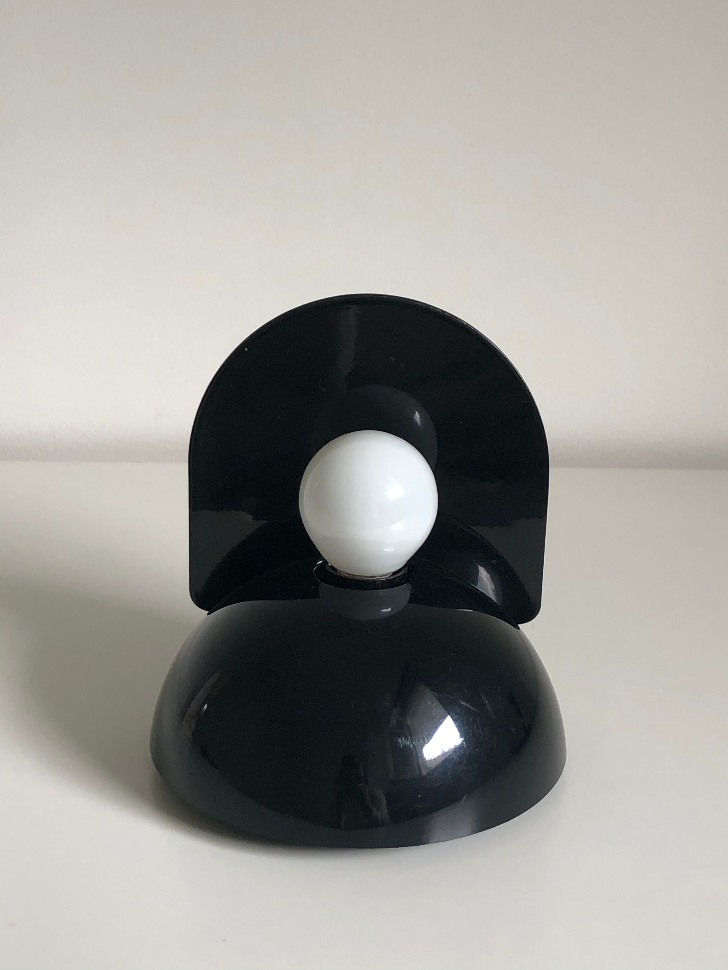 Claudio Dini's black Buco applicator edited by Artemide, 1974