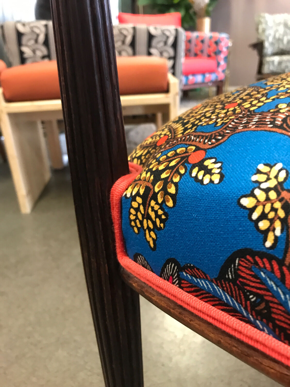 Art Nouveau armchair with a floral seat and backrest.