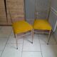 Pair of vintage golden designer chairs from the 50s