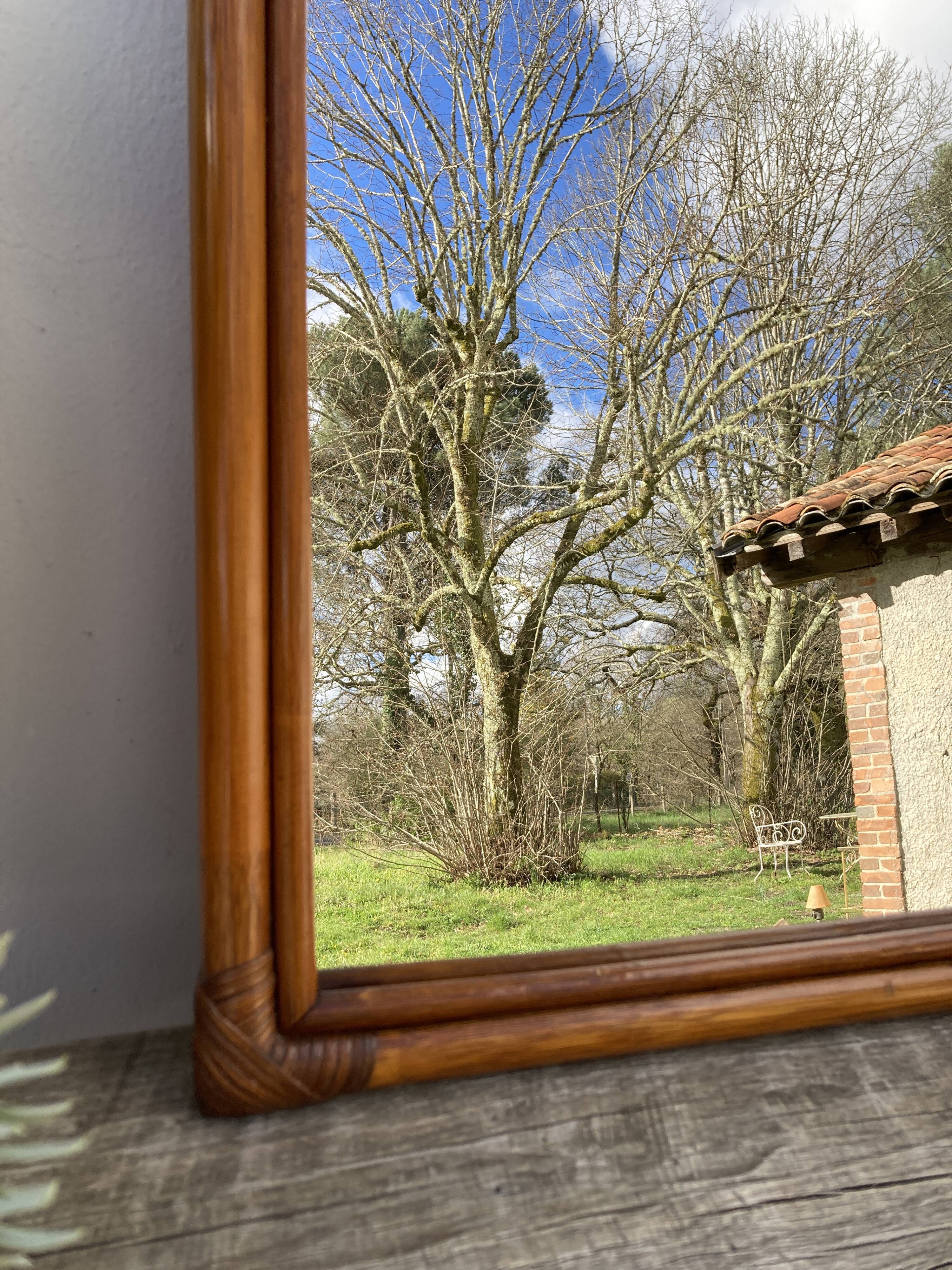 Vintage ethnic rattan mirror