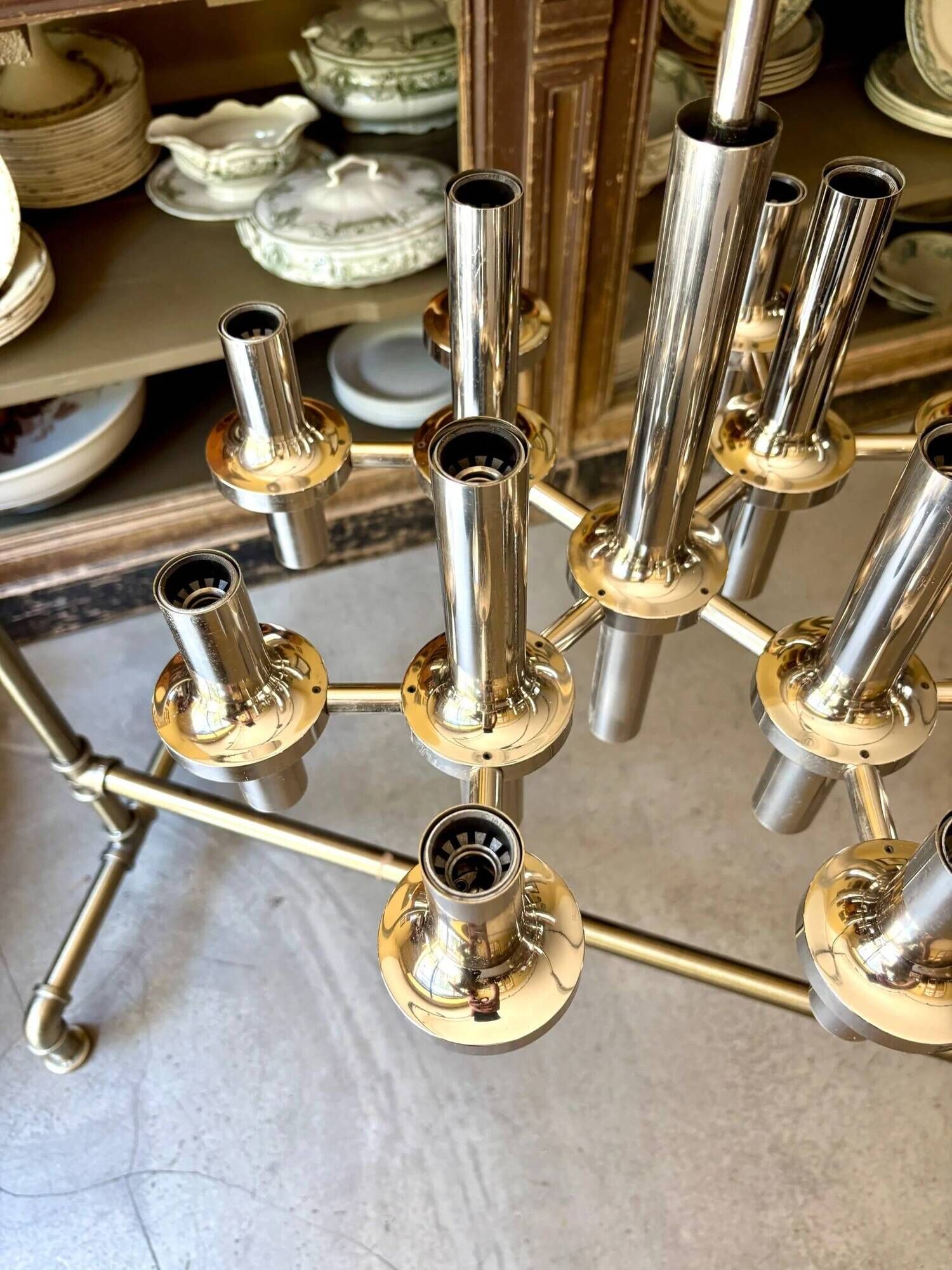 Chandelier with 12 lights in chrome metal attributed to Gaetano Sciolari for Staff Leuchten, 1970.