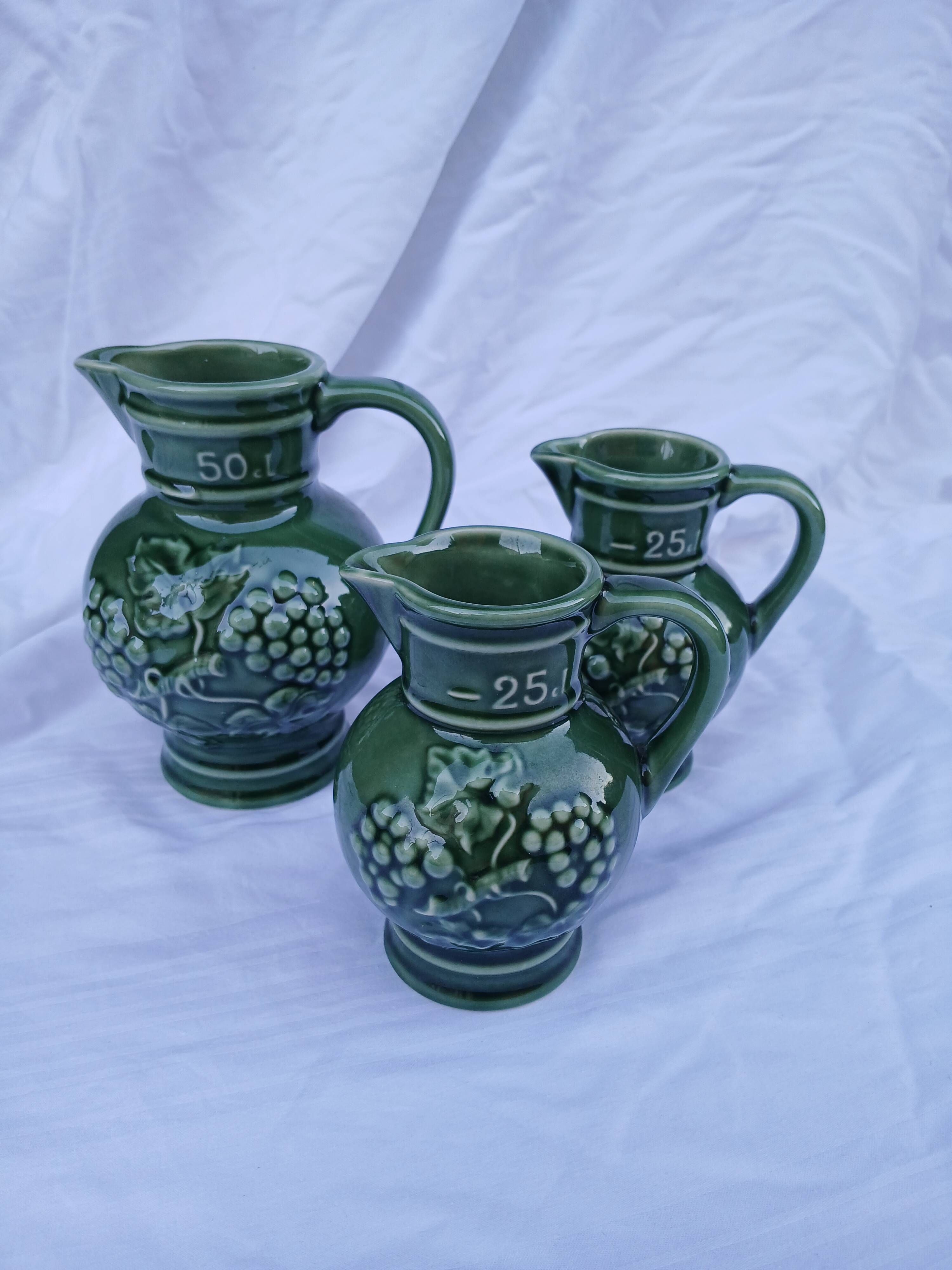 3 antique wine jugs