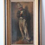 Old peasant painting in the hat