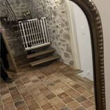 Large gilded mirror with pediment