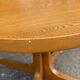 Baumann round extendable Scandinavian dining table with central leg, 1960s oak