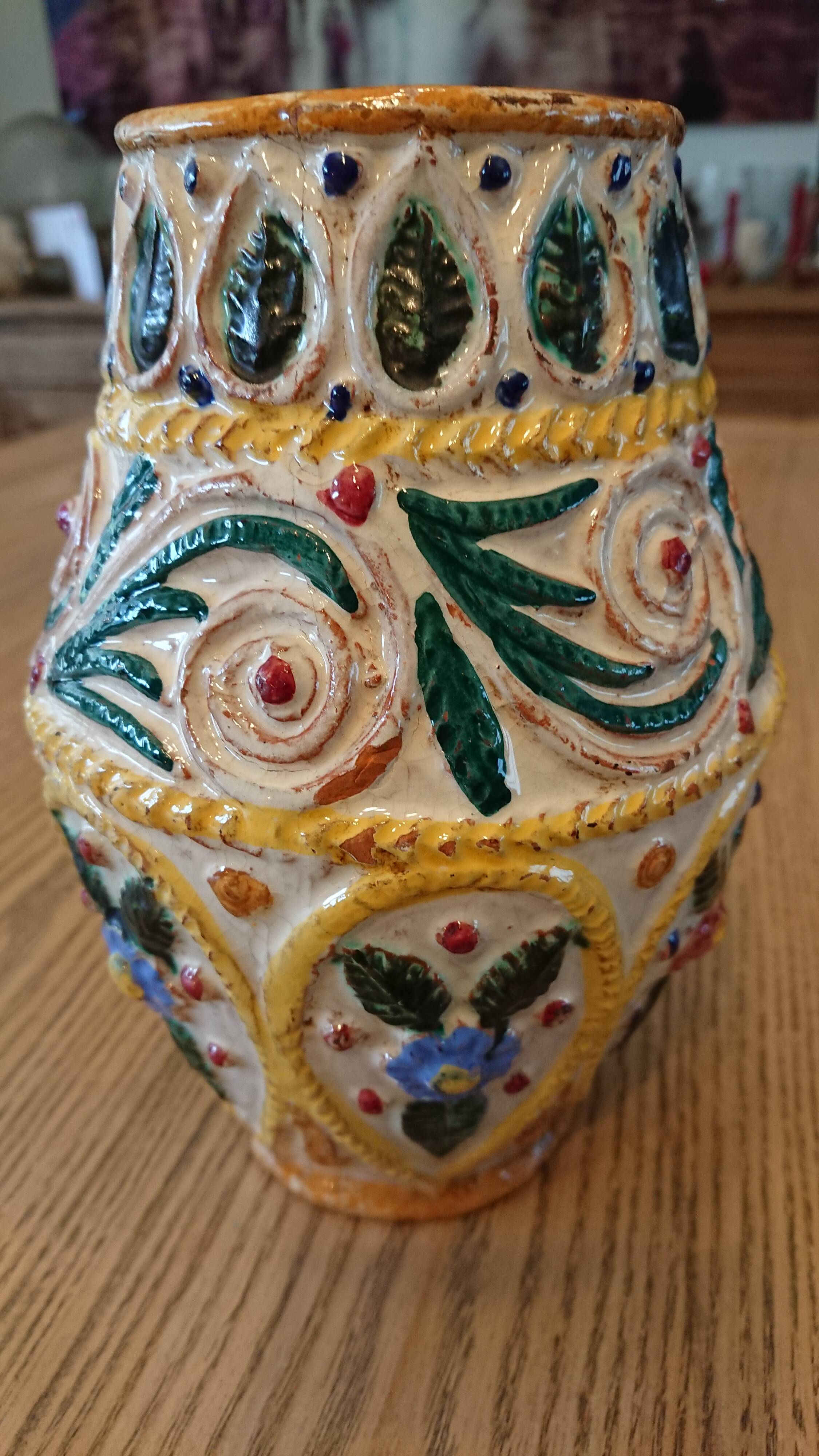 Hand-carved and hand-painted vase