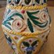Hand-carved and hand-painted vase