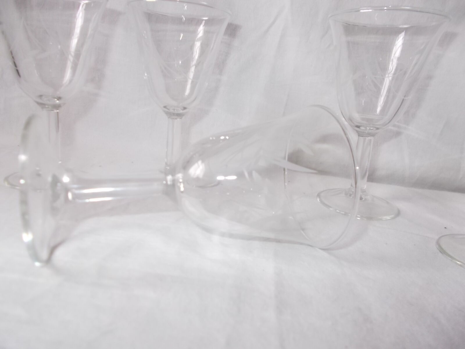 Set of 6 antique decorated wine glasses.