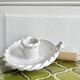Hand-held candle holder with braided ceramic bowl