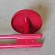 Set of 4 red metal coat hooks