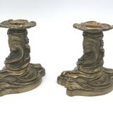 Pair of gilded bronze candlesticks with twisted decor and floral garlands, louis xv style