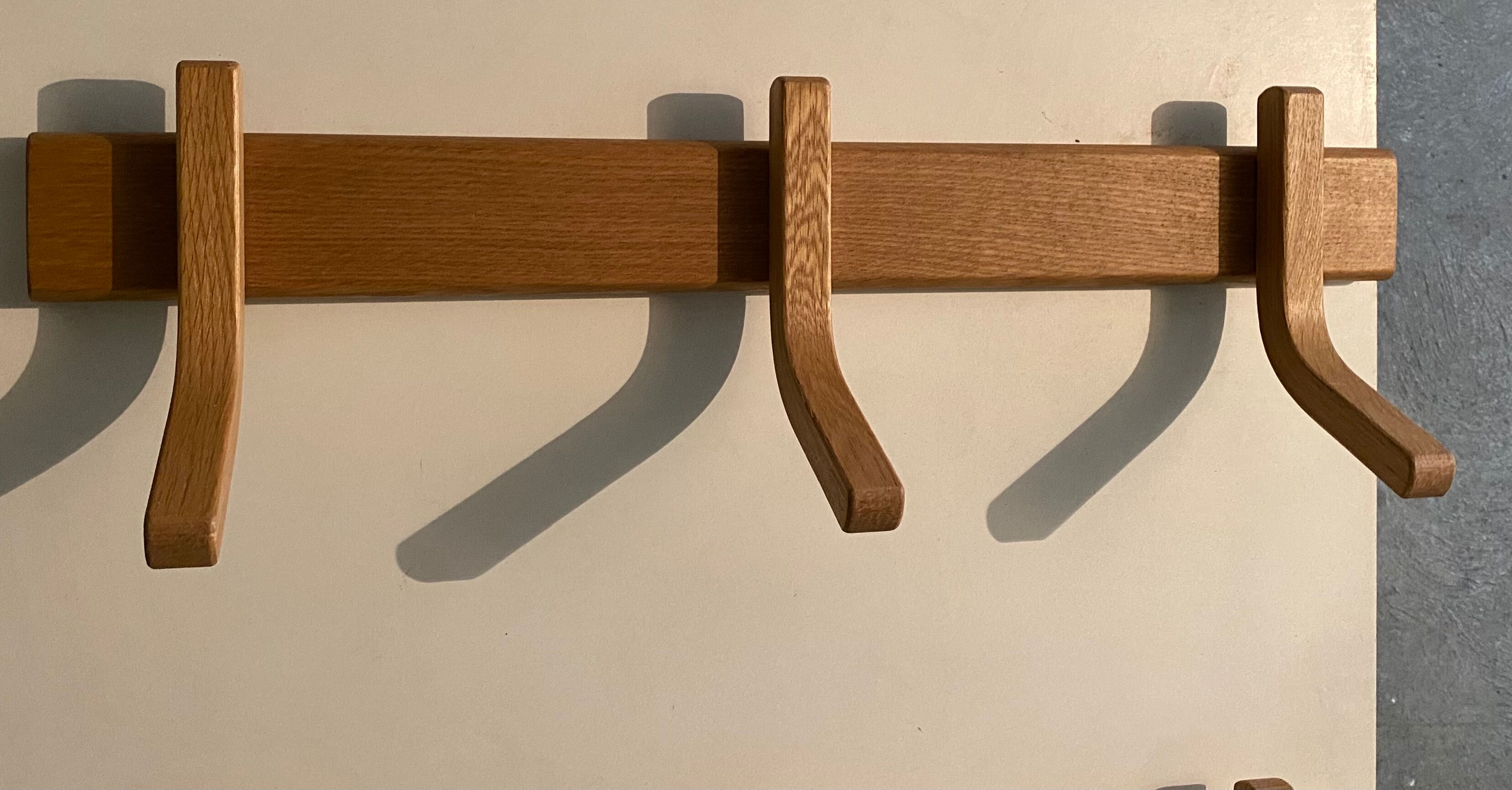 Wooden wall coat rack