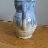 Pastel blue pitcher signed