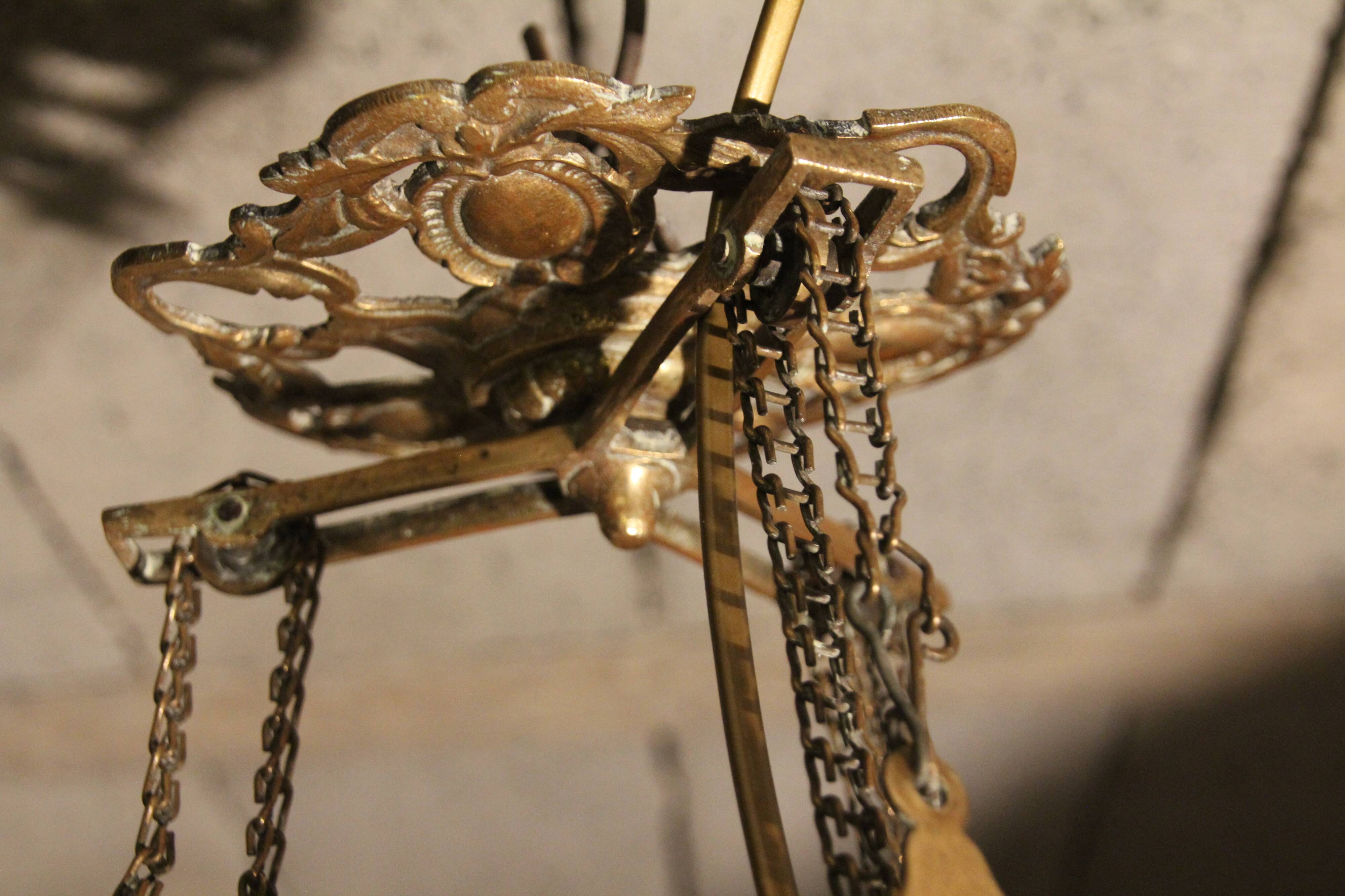 Large glass paste and brass chandelier in Art Deco style.