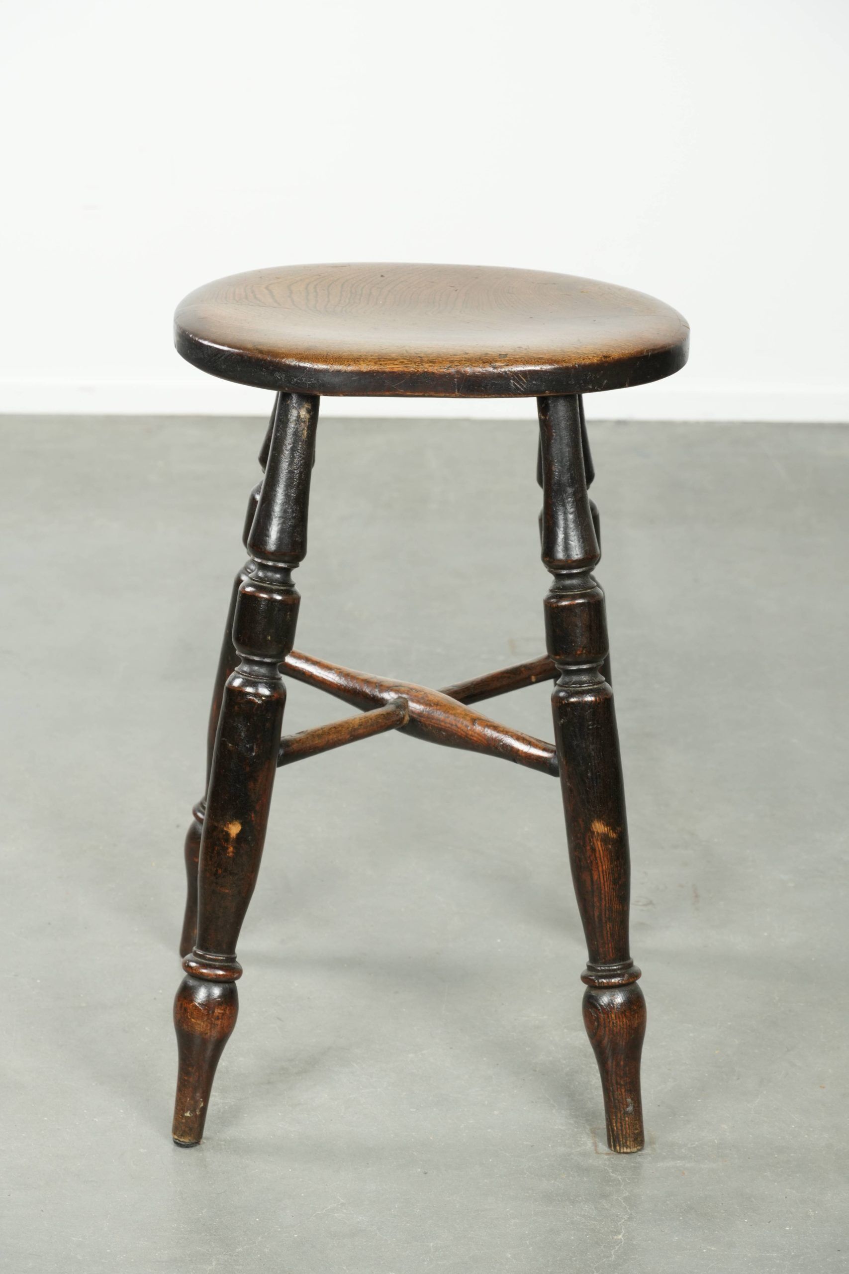 Antique English Windsor stool from the early 19th century