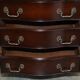 Vintage serpentine front hardwood chest of drawers