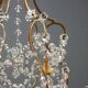 Antique chandelier in gilded iron and metal, Italy, 20th century
