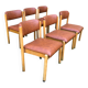 Six wooden and leatherette chairs