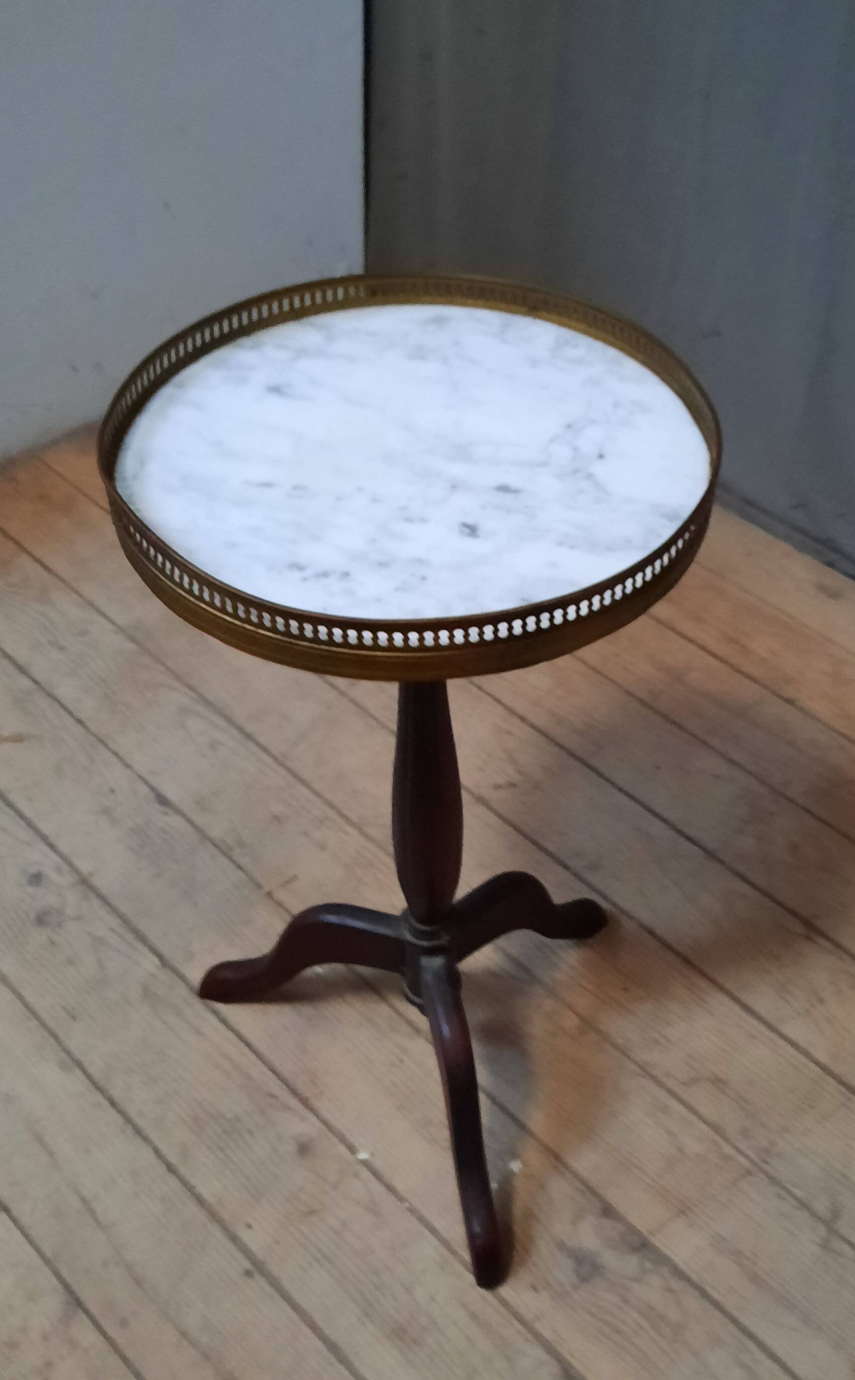 Small marble top pedestal table