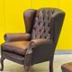 Dark Brown leather chesterfield wing chair with Ottoman