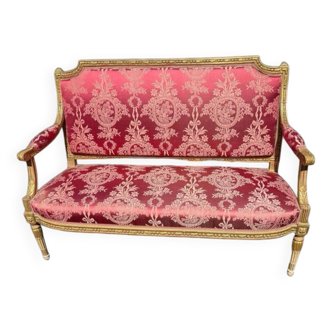 Louis XVI sofa in gilded wood