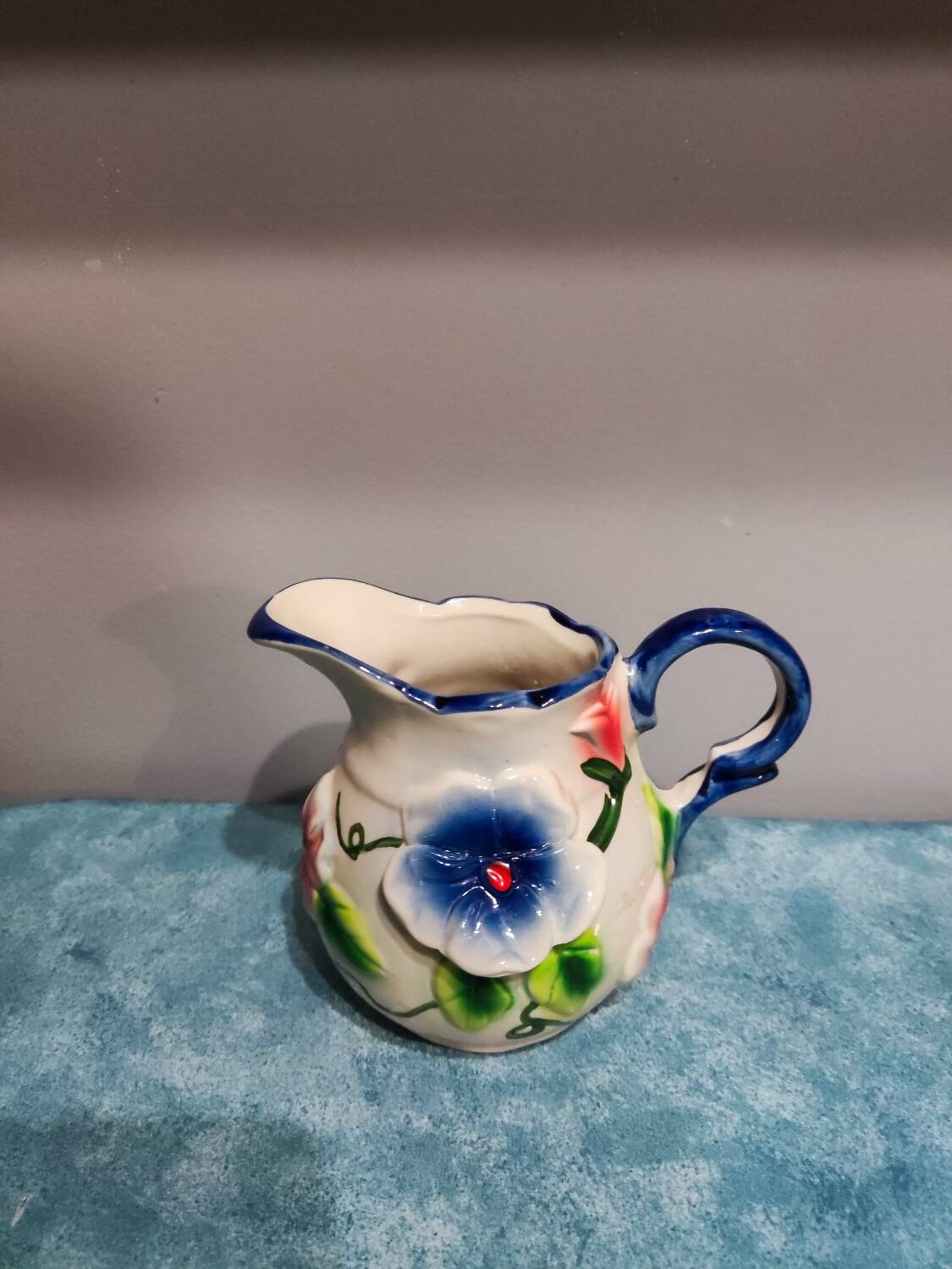 Earthenware milk jug