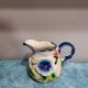Earthenware milk jug