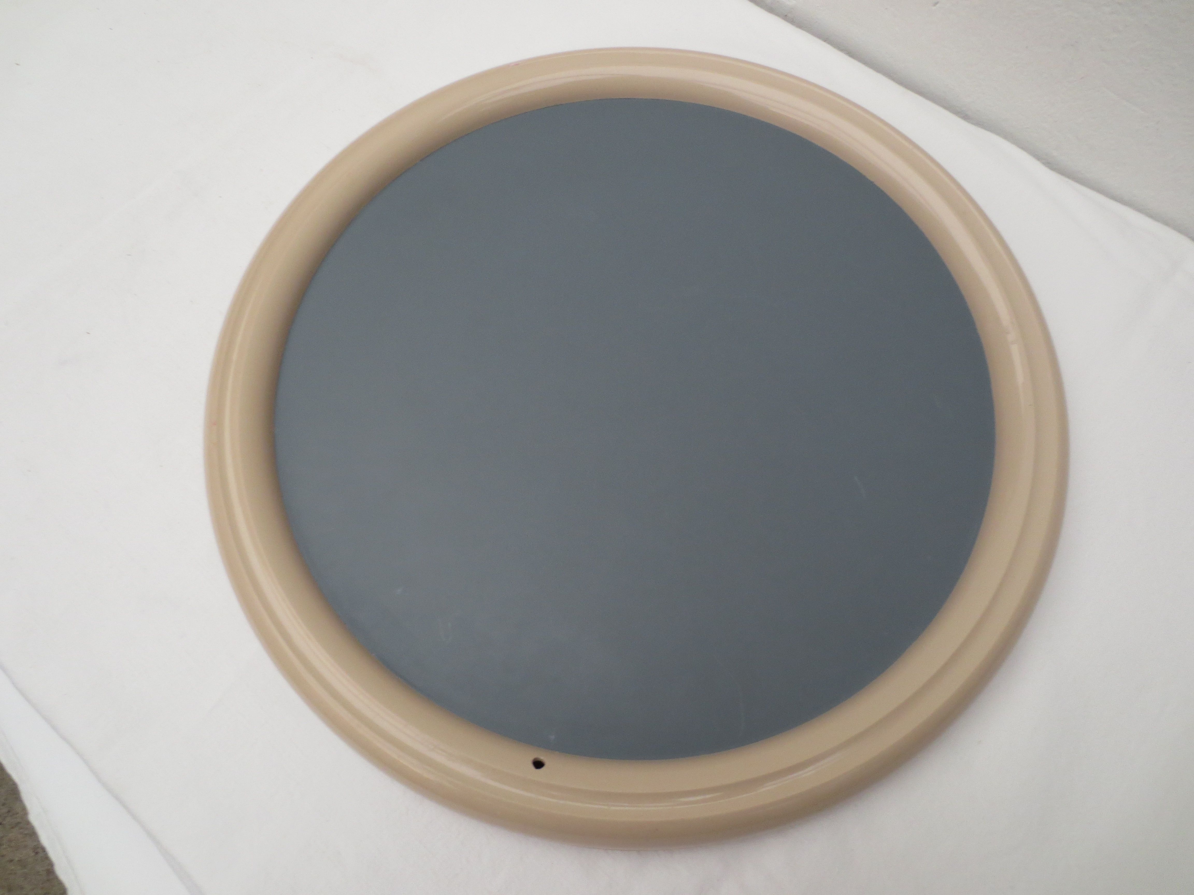 Circular mirror of the 70s