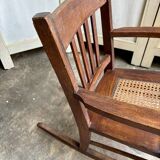 Children's rocking chair in dark wood and cane