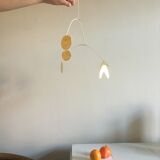 Mobile brass and rattan
