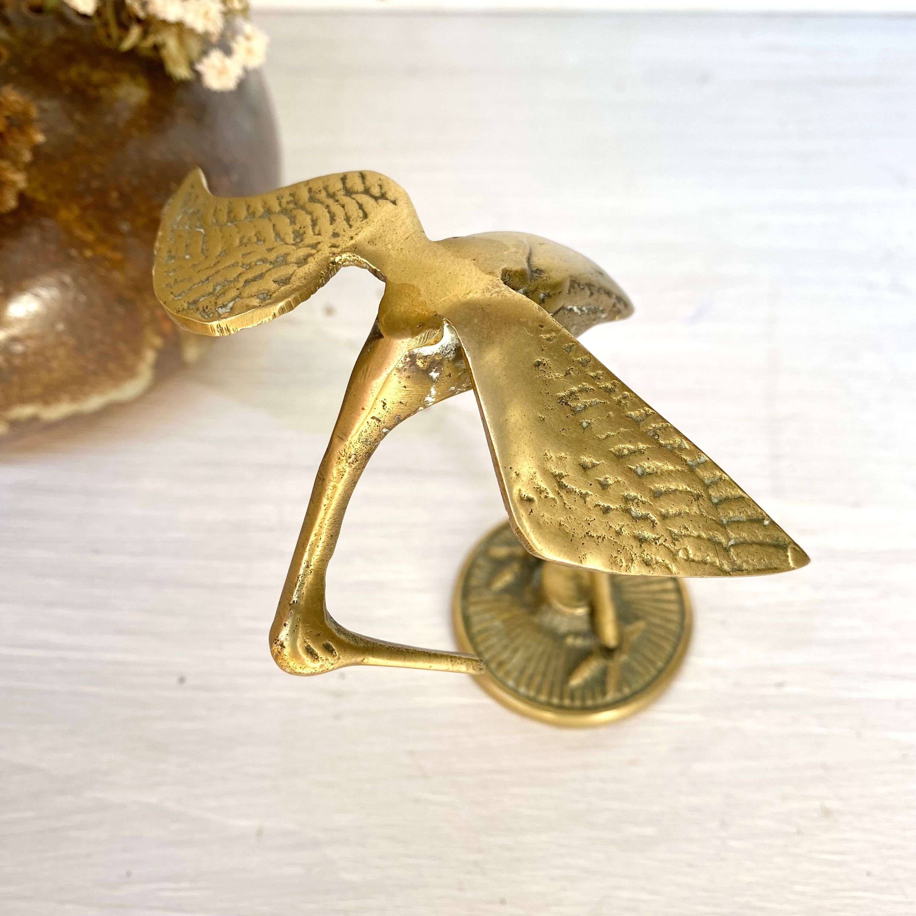 Golden brass bird
