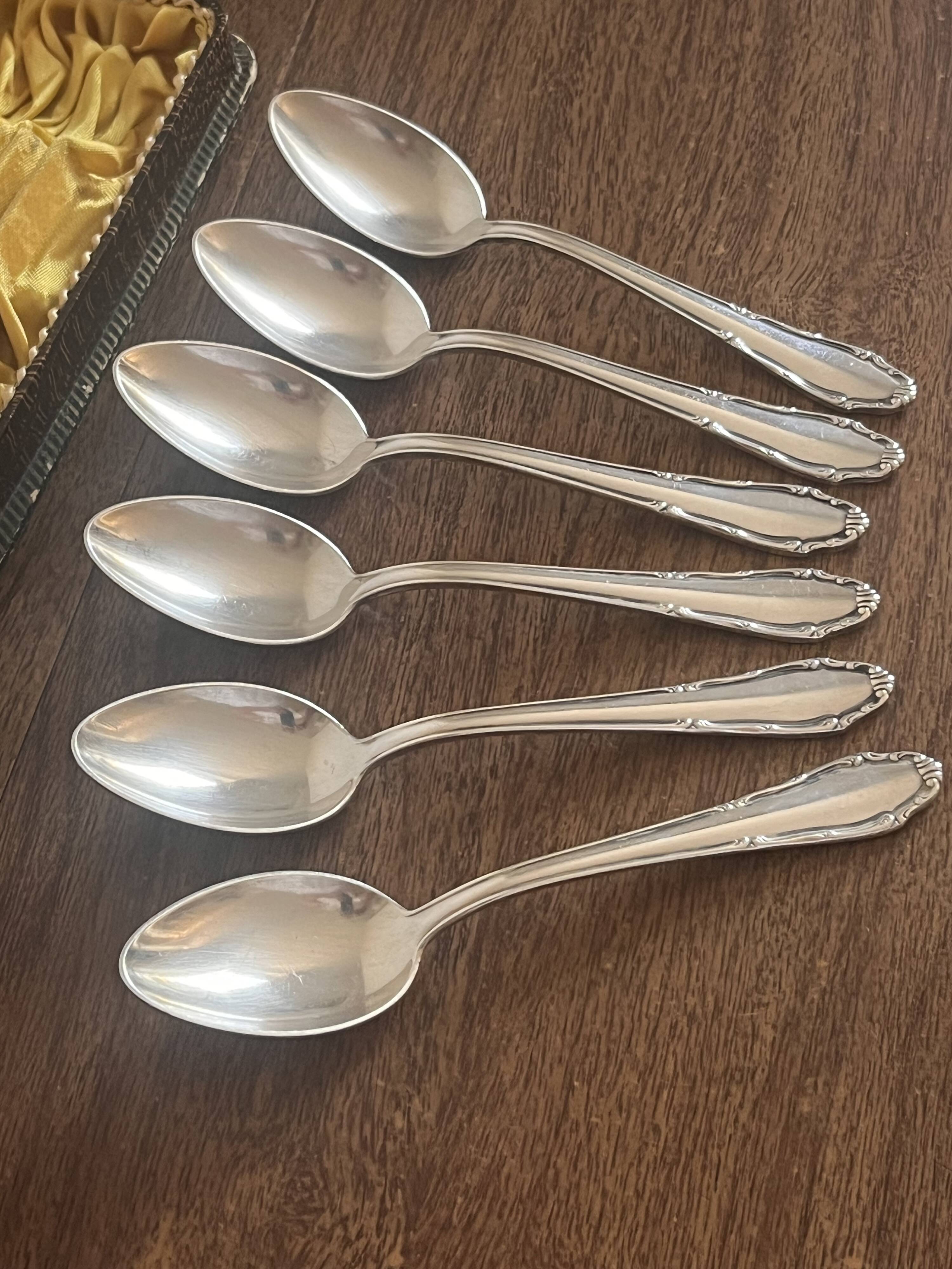 Small silver-plated metal spoons