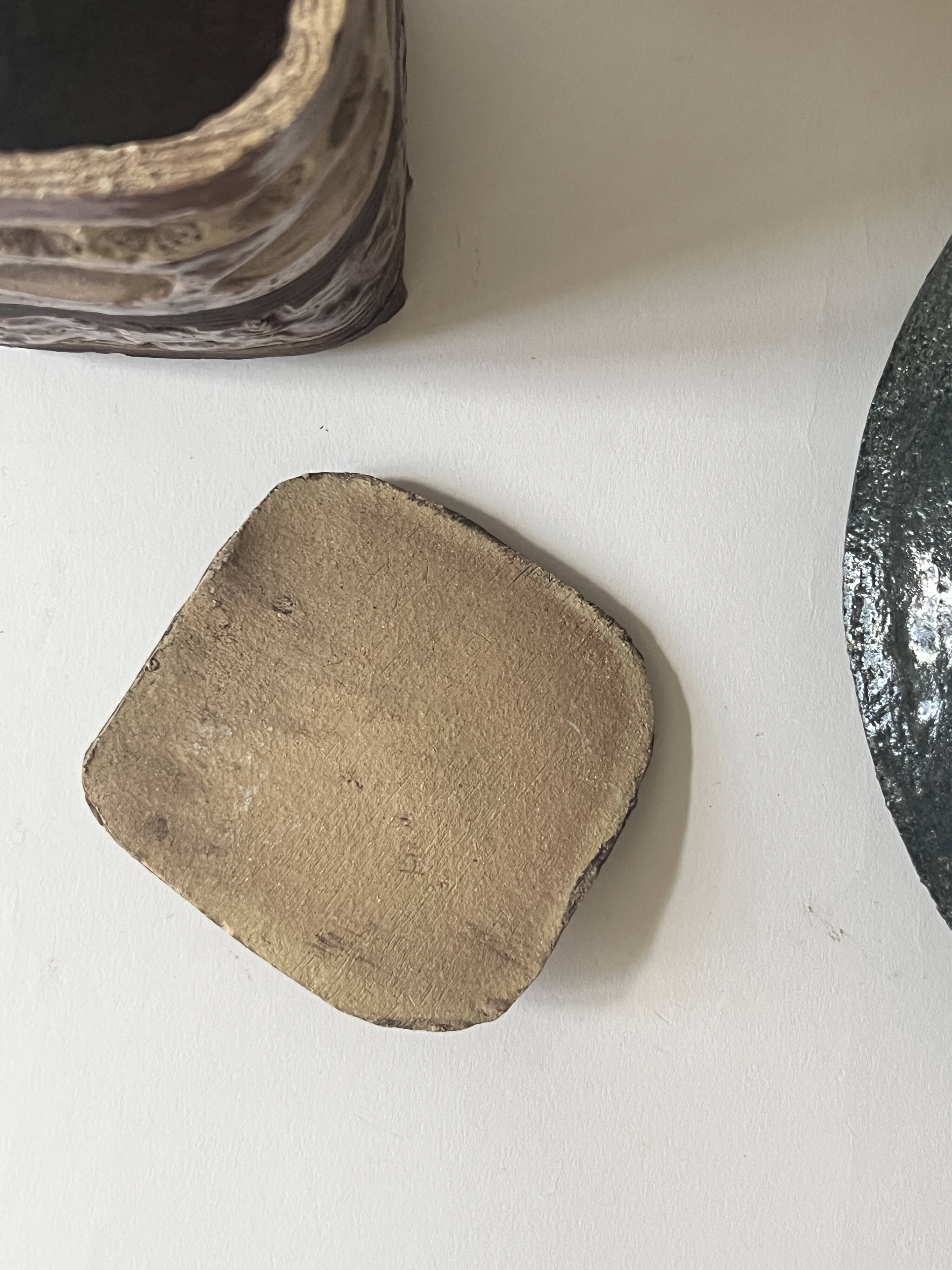 Vintage ceramic closed pocket emptier signed KS