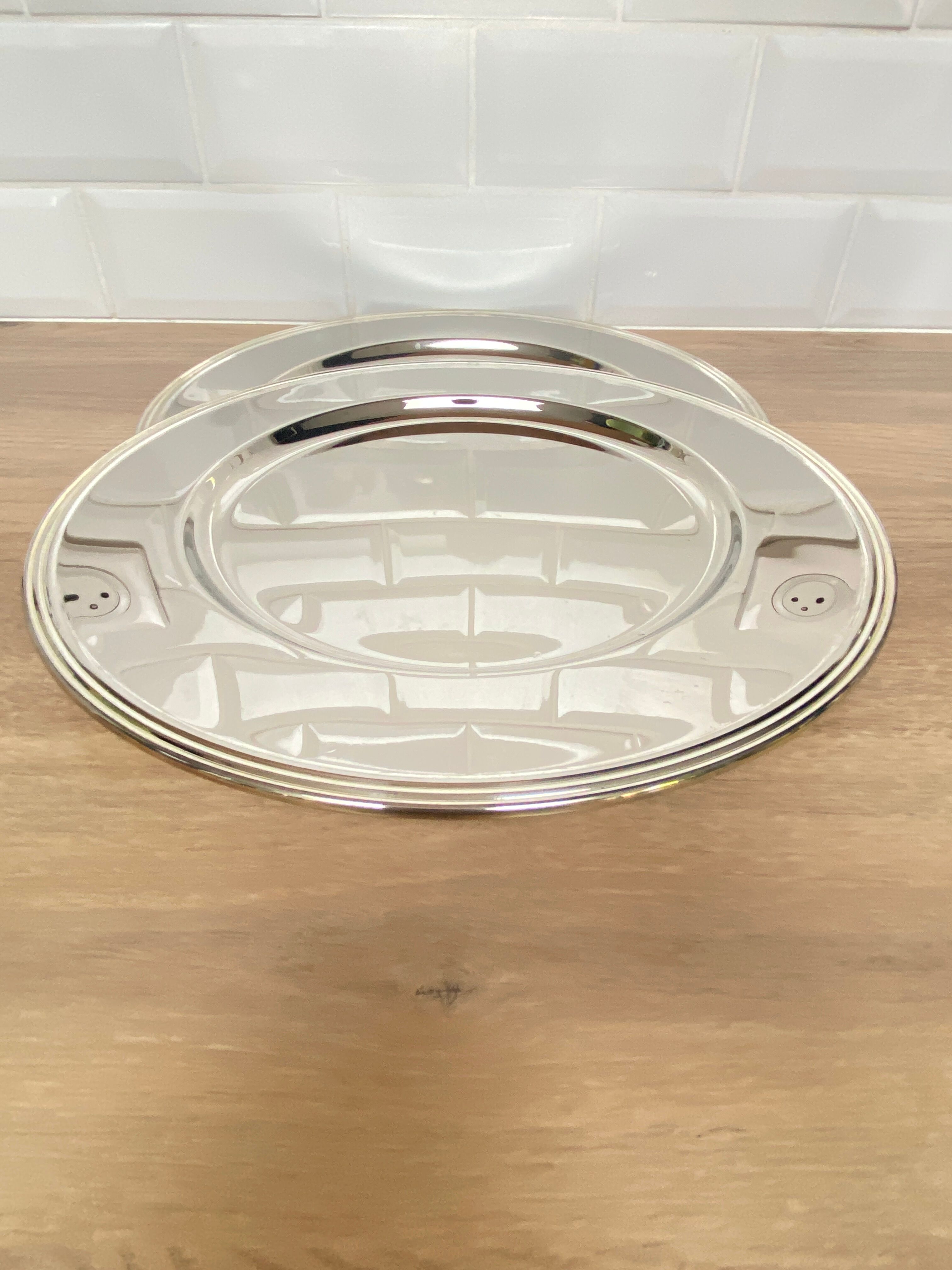 Pair of silver metal subplates