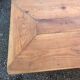 Antique cherry farmhouse table with turned legs and 2 drawers.