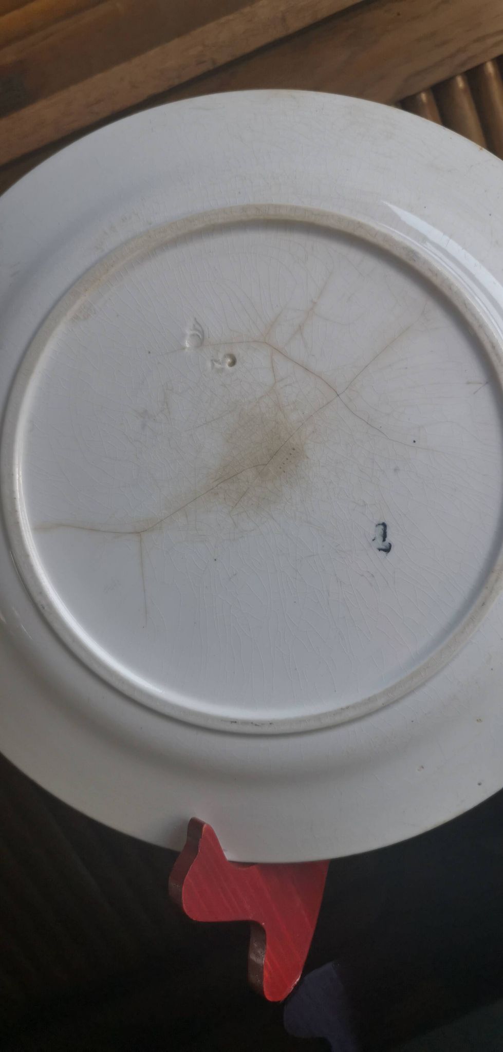 Flat round dish in pink iron earth Earthenware from Onnaing