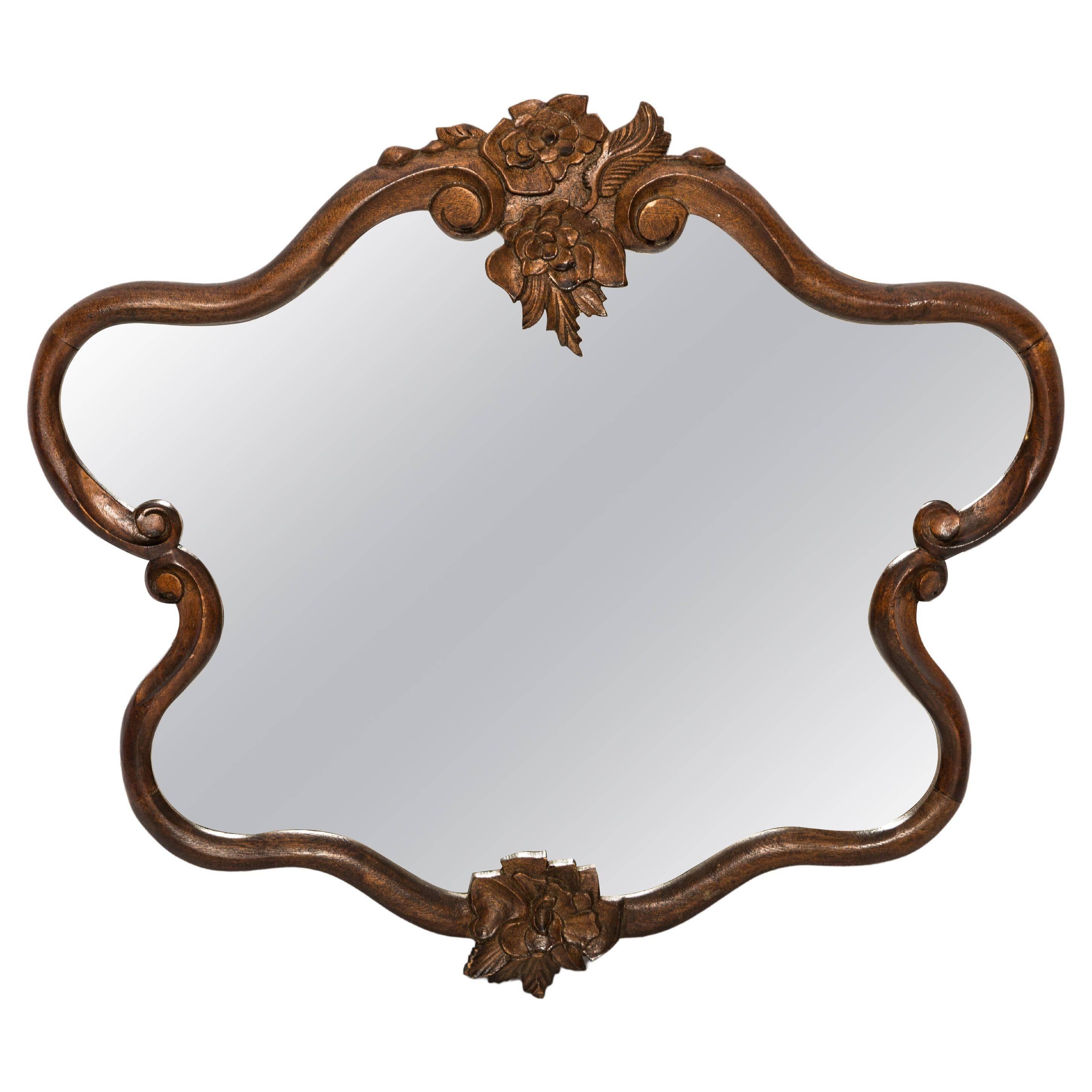Medium vintage mirror in dark brown wood, Europe, 1960.