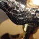 Black and gold Murano flower wall light