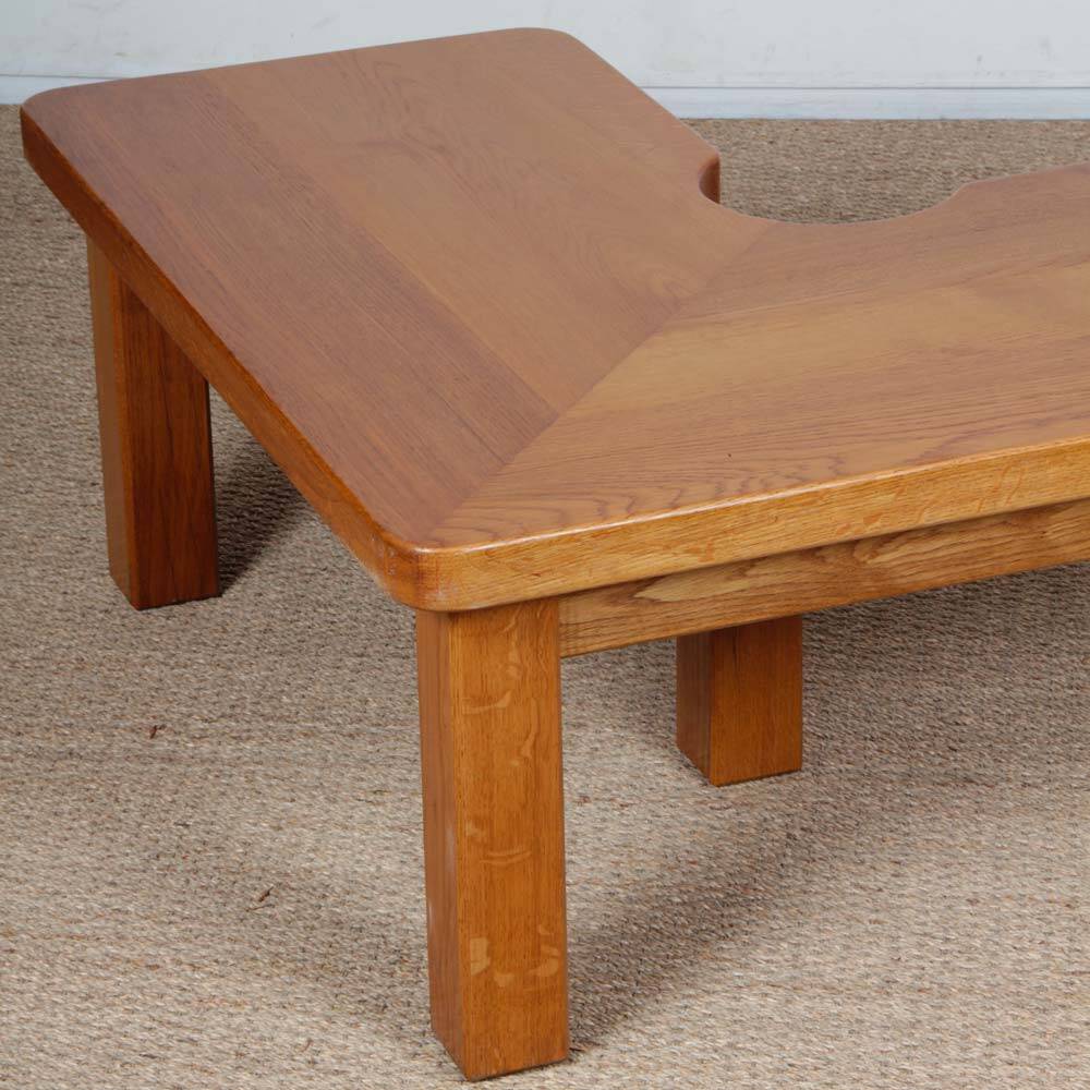 Solid oak coffee table in the style of Seltz, 1980.