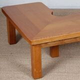 Solid oak coffee table in the style of Seltz, 1980.